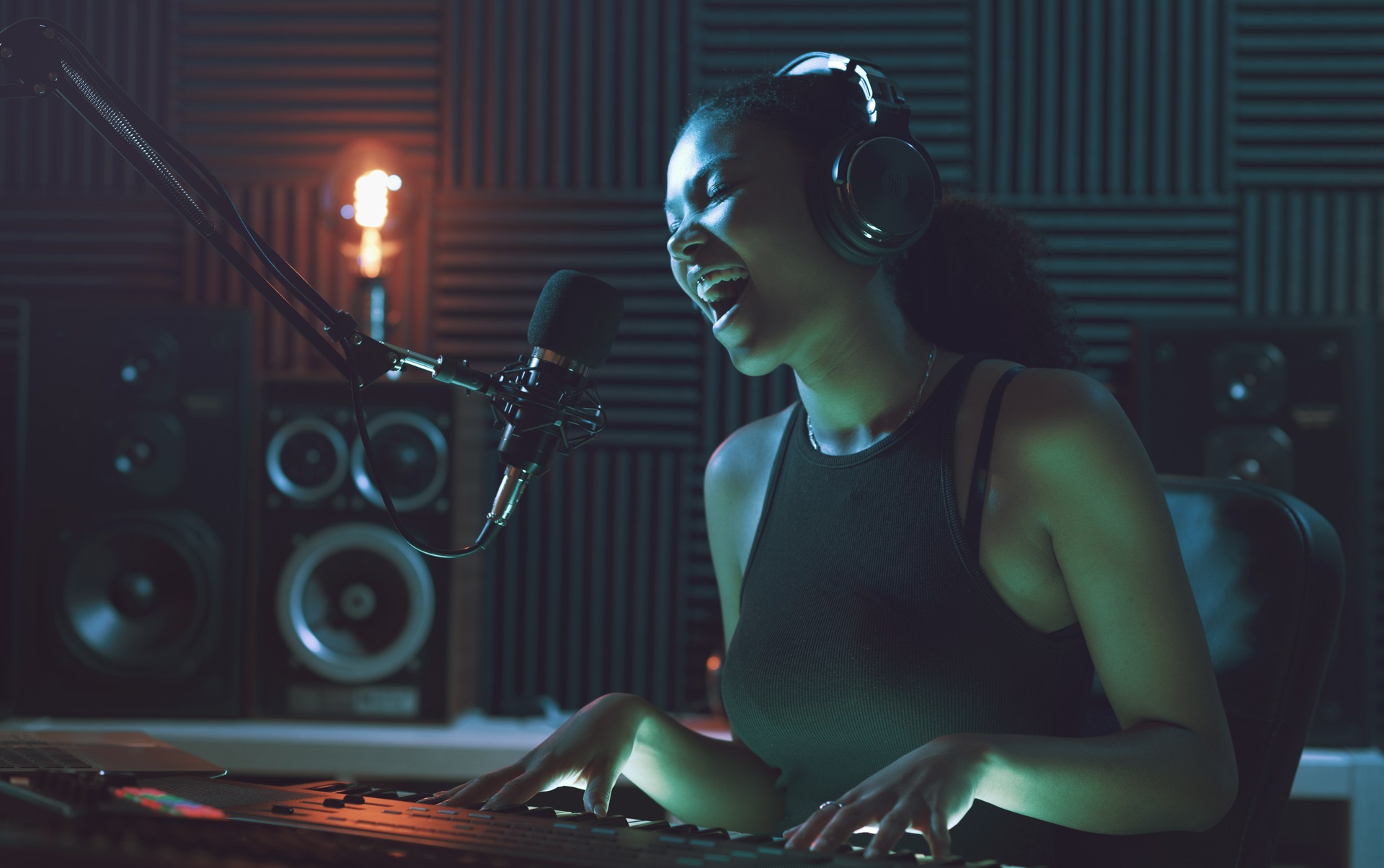 Artist recording a song in the studio